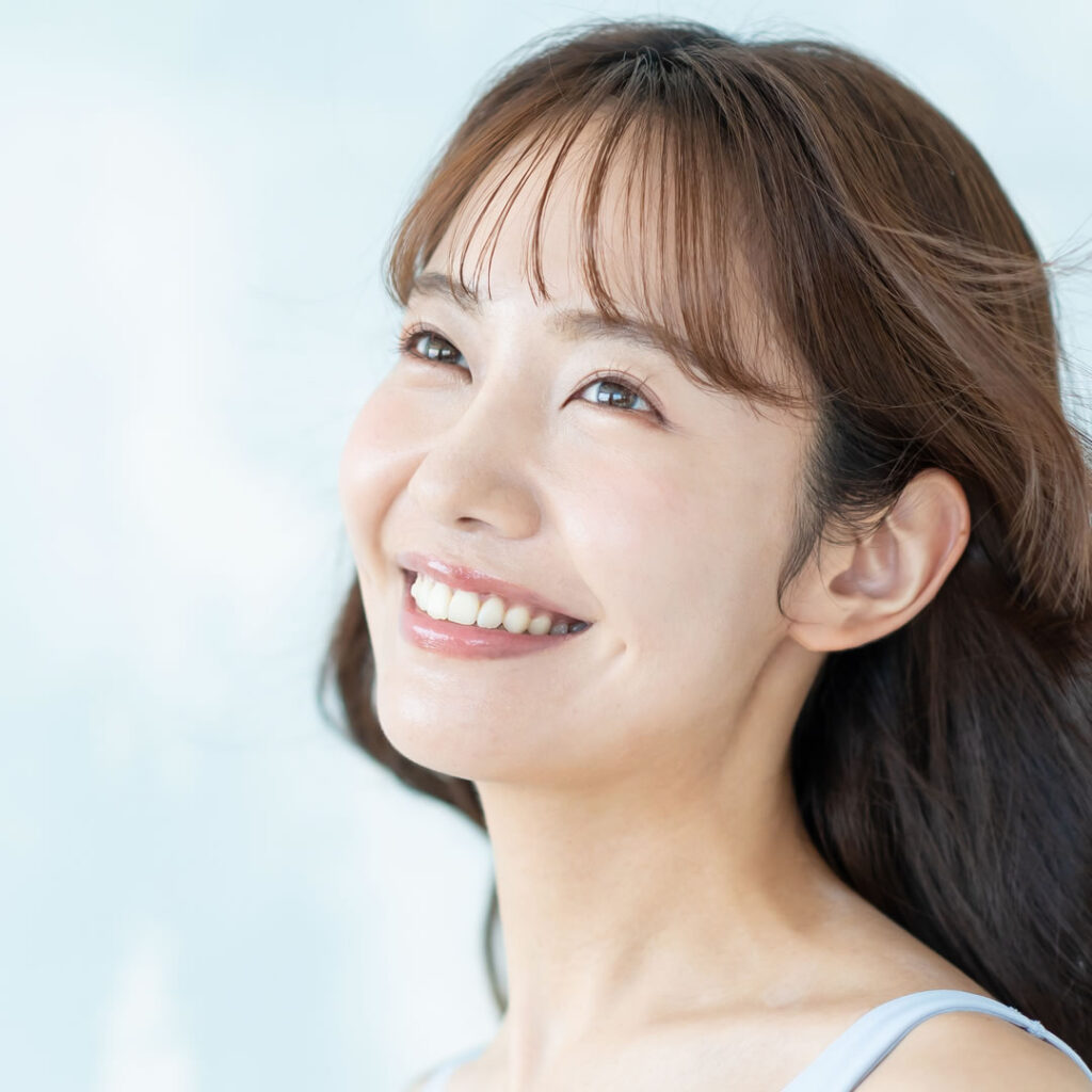 ガミースマイルを改善した女性